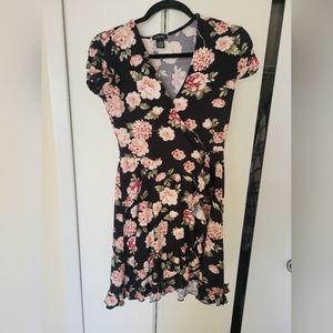 Floral dress with small puff sleeves.